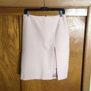White House Black Market blush pink colored skirt